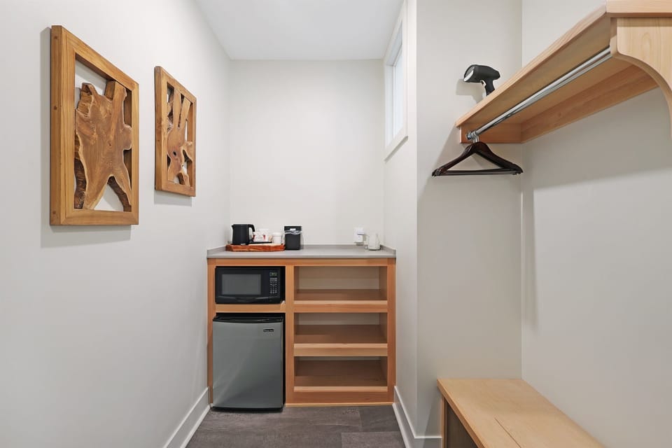Kitchenette area with mini fridge, microwave, tea kettle, & complimentary coffee for your 1st morning