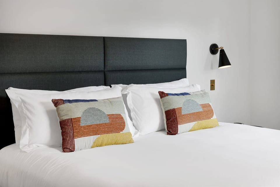 Bedside sconces and mountain modern design