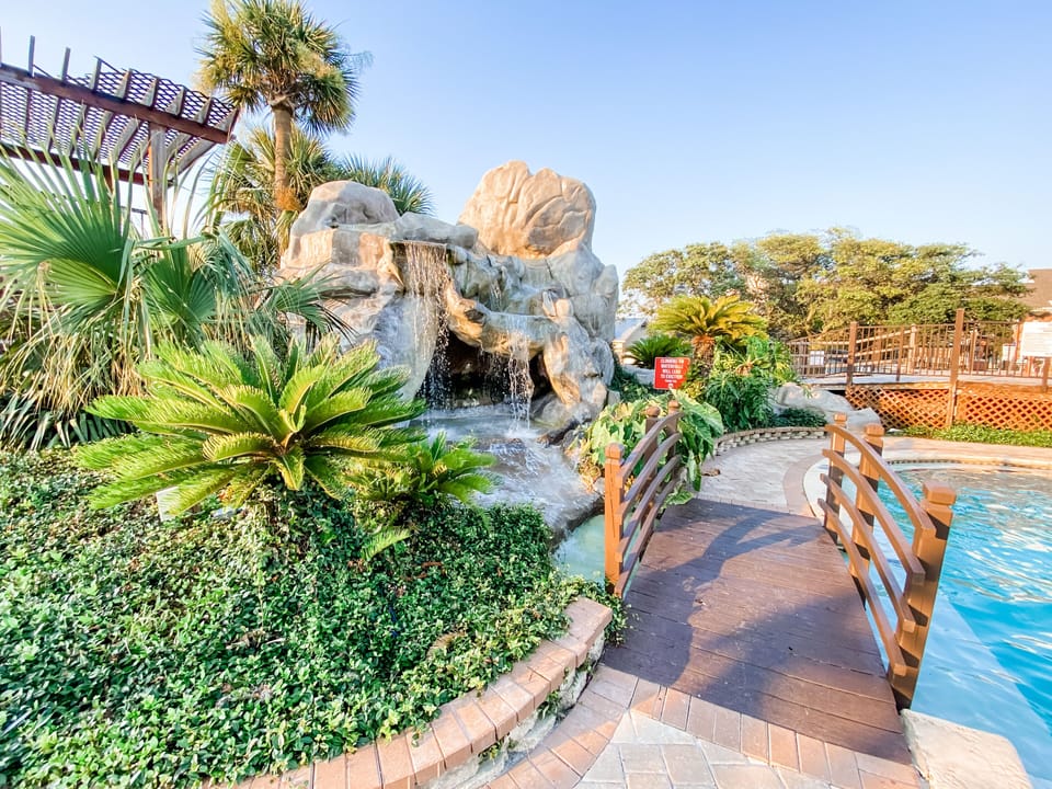 Waterfall flows into the resort pool