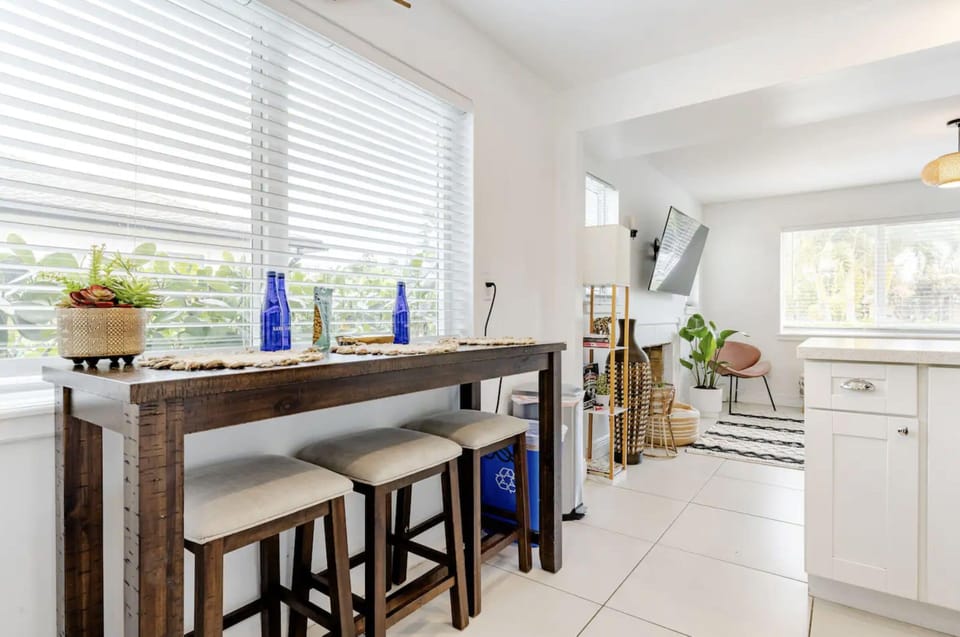 High top seating in the kitchen, with room for three.