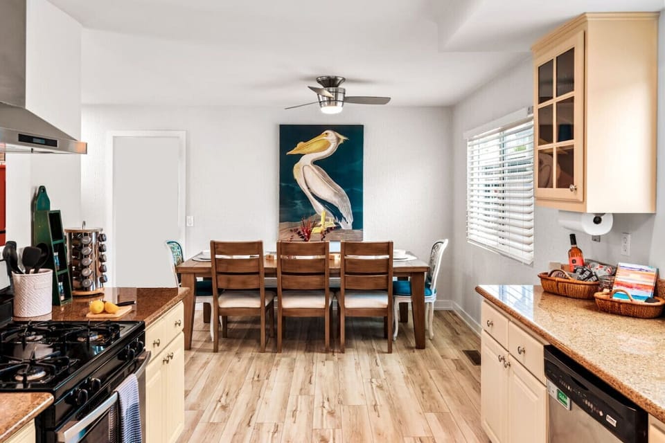 Dining for 8 in this fully-equipped kitchen. Prepare your meals or order local food and dine indoors our outdoors on the upper deck! Enjoy your morning with a  cup of coffee or tea with locally roasted whole beans from Vigilante Coffee Roasters!