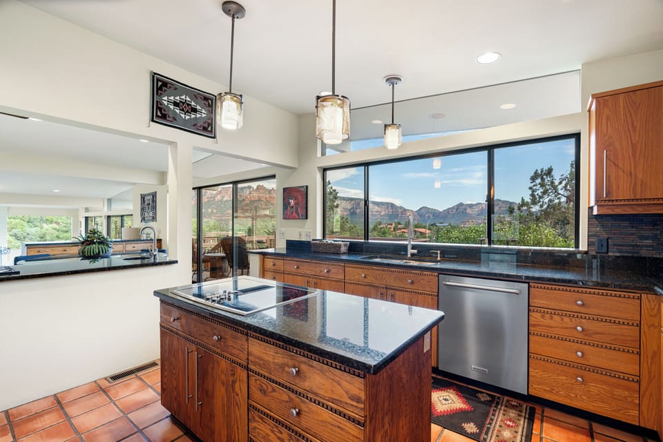 Ample counter space with kitchen island for meal prep