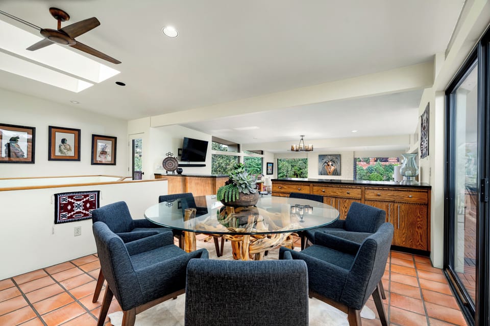 Enjoy dining with floor-to-ceiling windows that frame the views.
