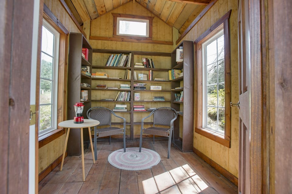 Relax in the little library and borrow any of the provided books.