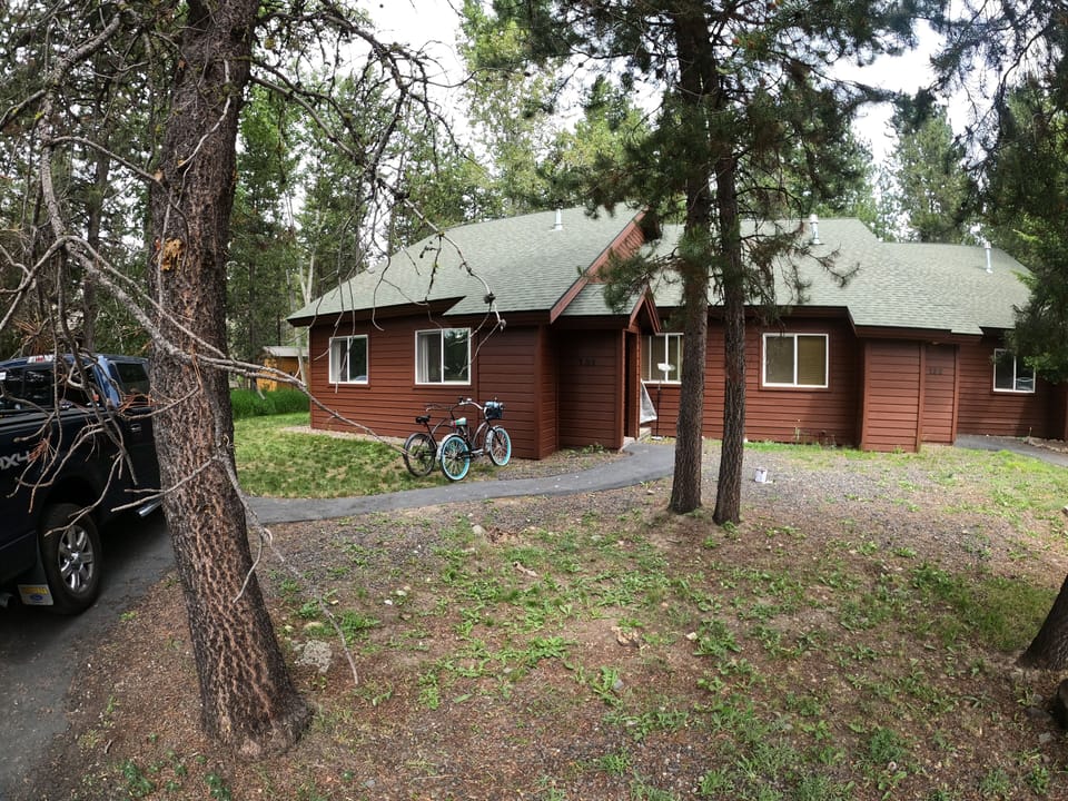 Condo on end of property giving big side-yard to play games or park bikes/kayaks