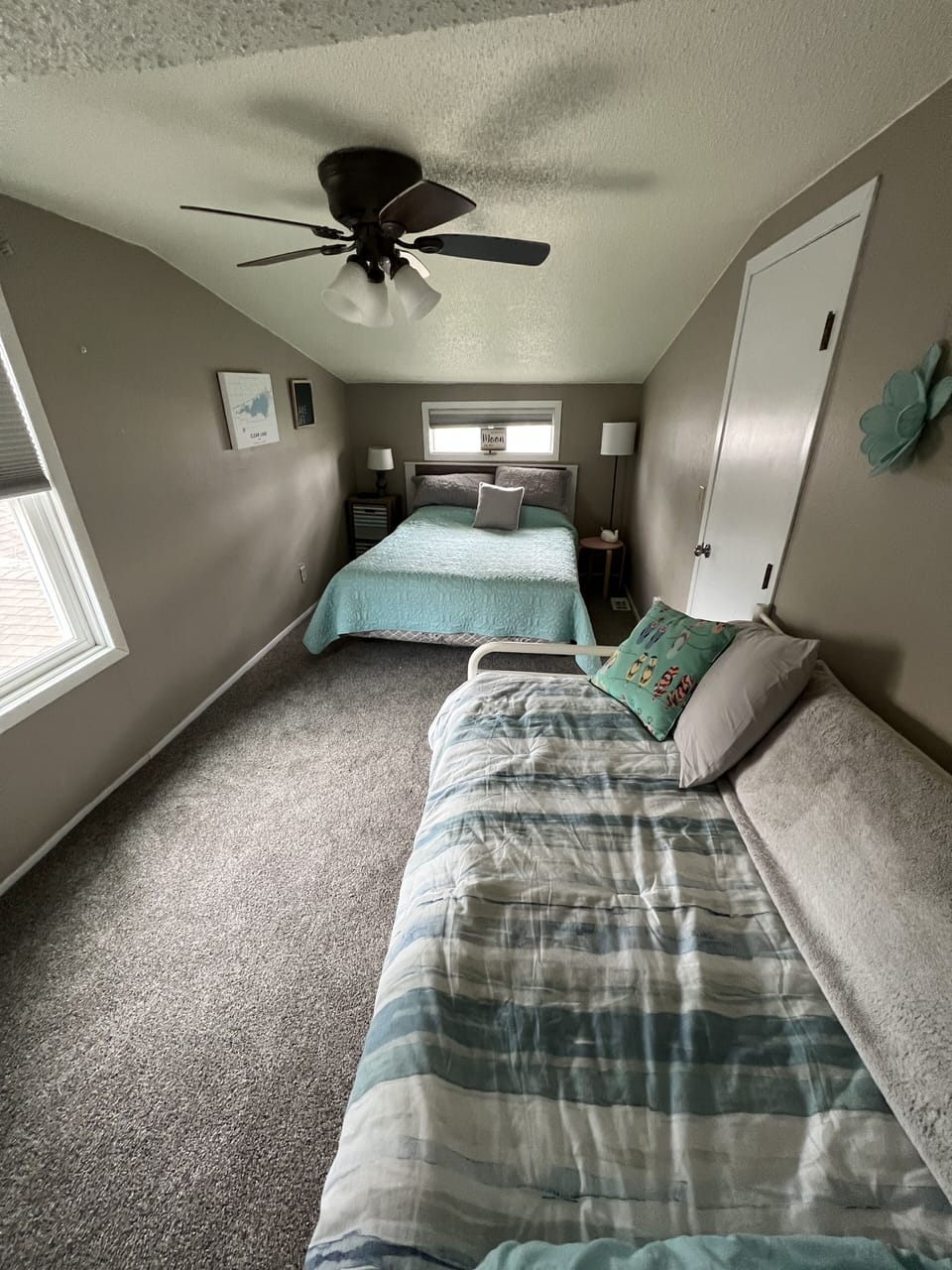 Full size bed and a twin trundle. 