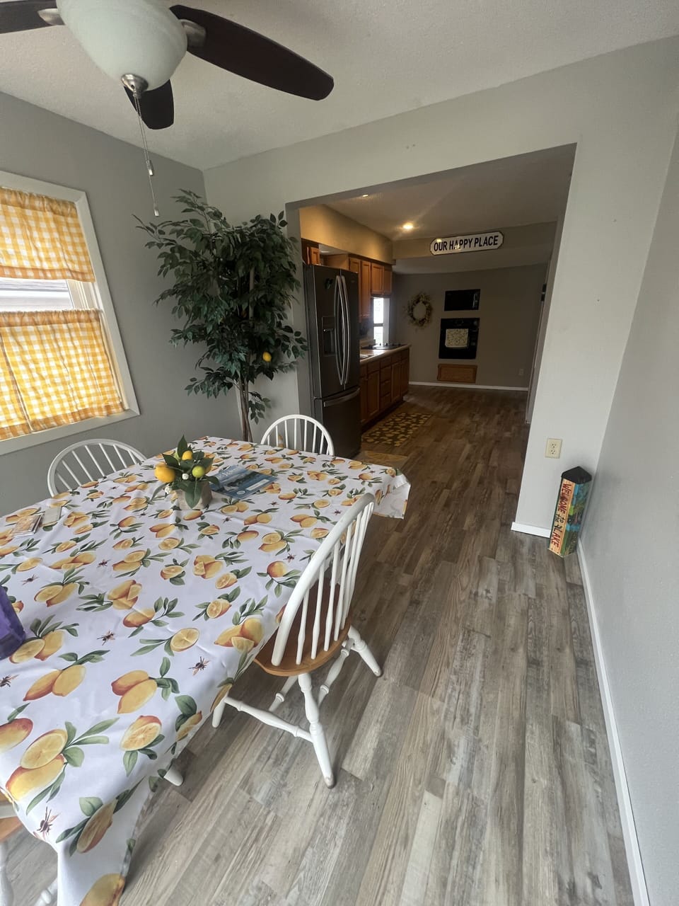 Dining room seats 4, looking to the kitchen you will see the oven in the wall