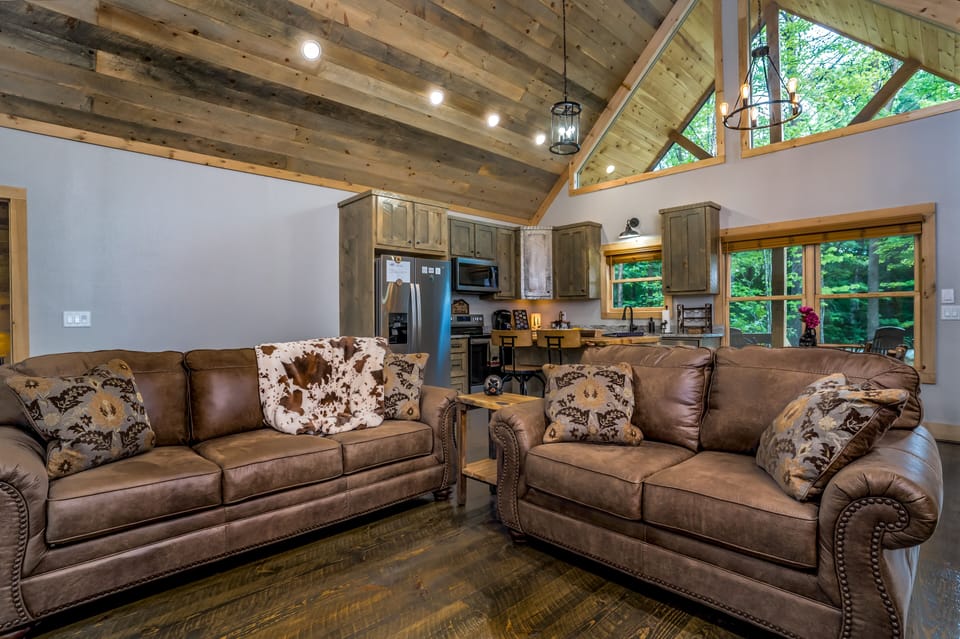 Sofa to the left has a Queen Sleeper sofa.