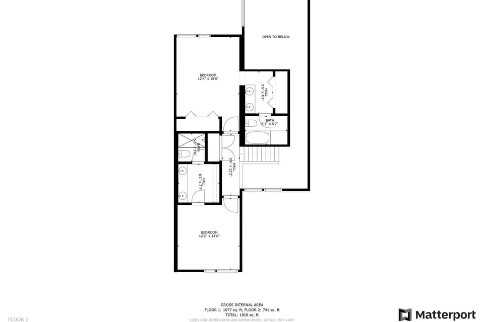Two bedrooms on the upper level have en-suite baths