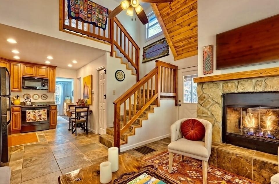 Cozy open concept living—with a TV and gas-log fireplace! 