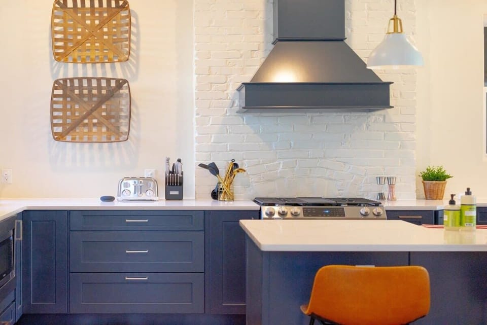 This high-end transitional kitchen is the heart of the home