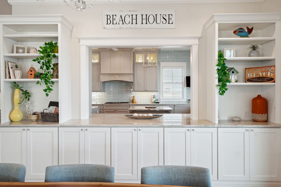 Home features a kitchen pass through window for easy meal service.