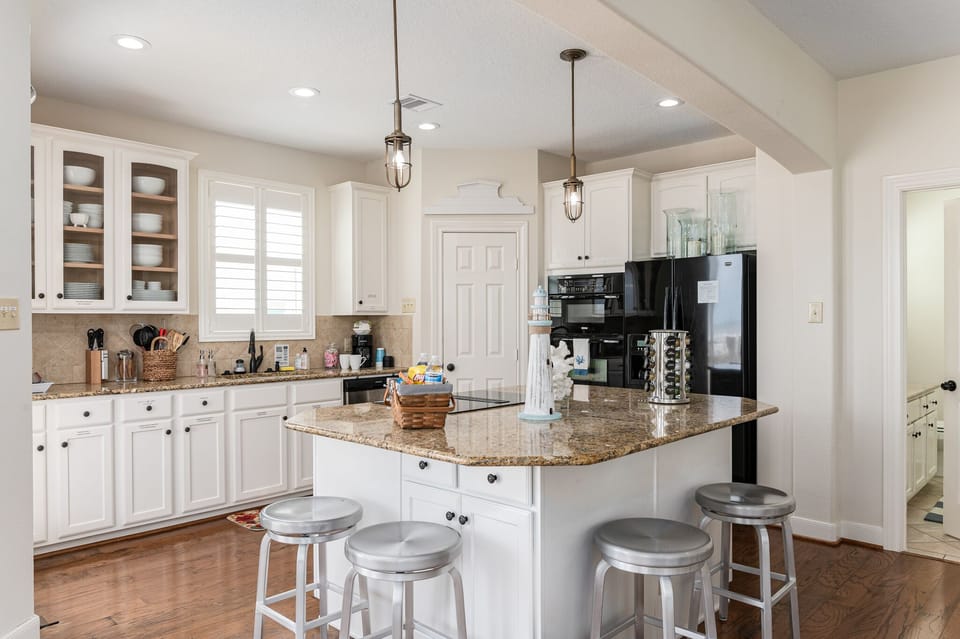 Breakfast bar with four chairs to spin the night away.
