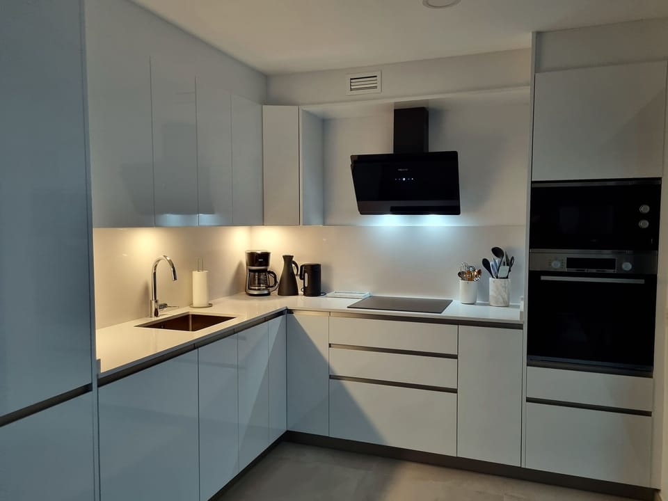 Kitchen with dishwasher and microwave