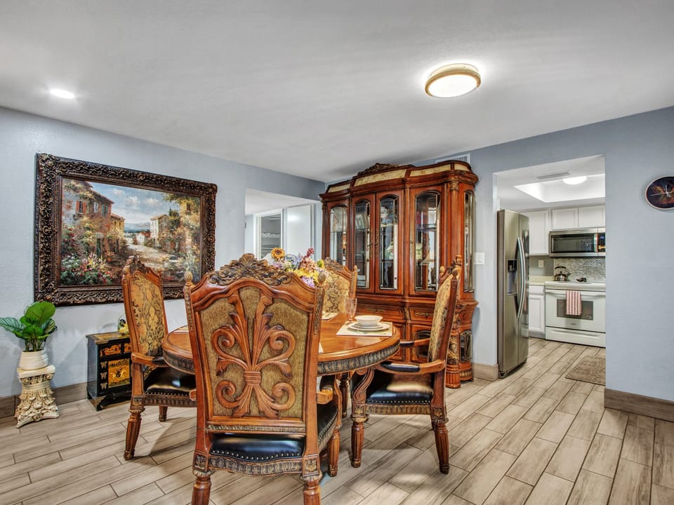Beautiful dining table and china cabinet with serving dishes