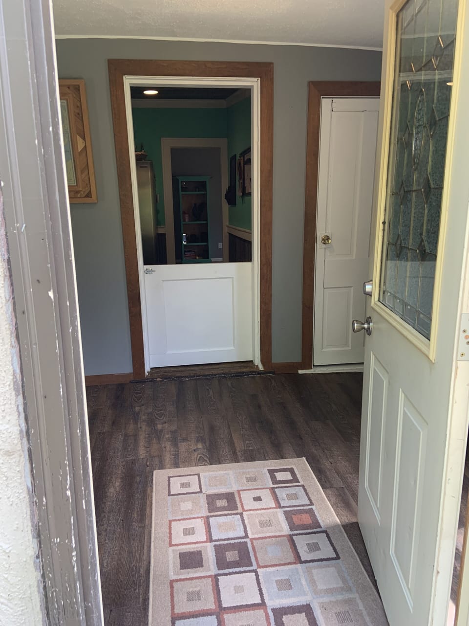 entryway with lockable gate to keep pets safe.
