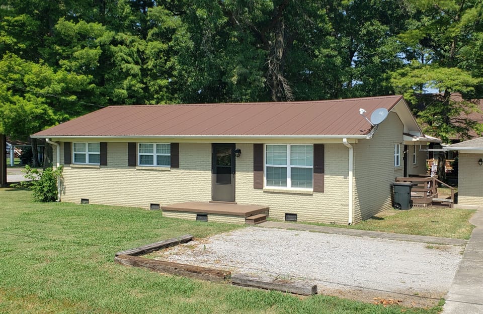 gravel extension to Driveway to accommodate truck and boat parking x 2.