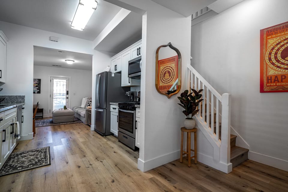 Stairwell leading up to master bedroom and Peloton room.