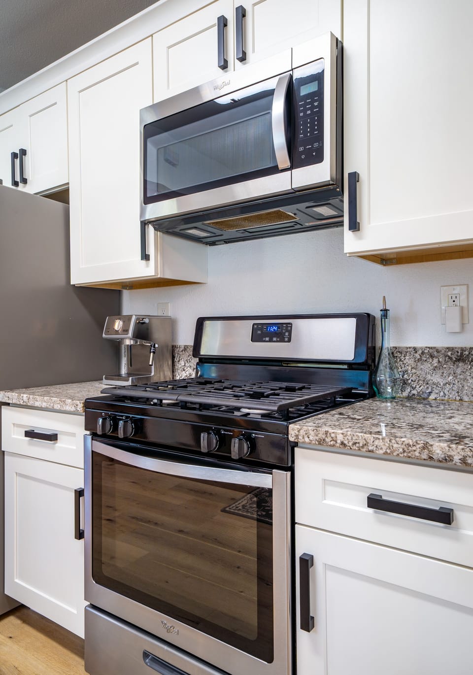 Gas stove plus microwave.