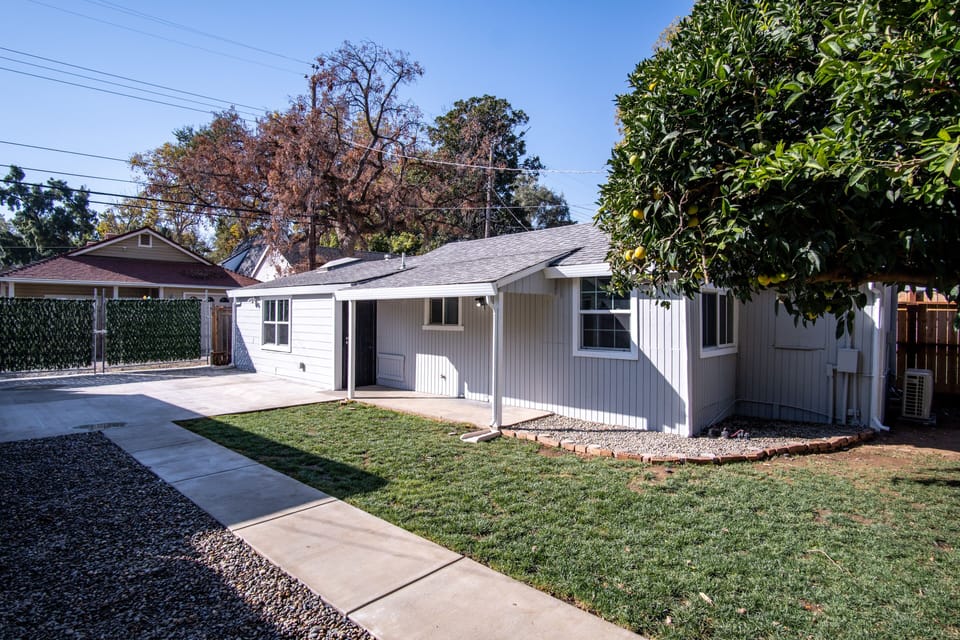 Shared yard space with private, electric gate entrance .