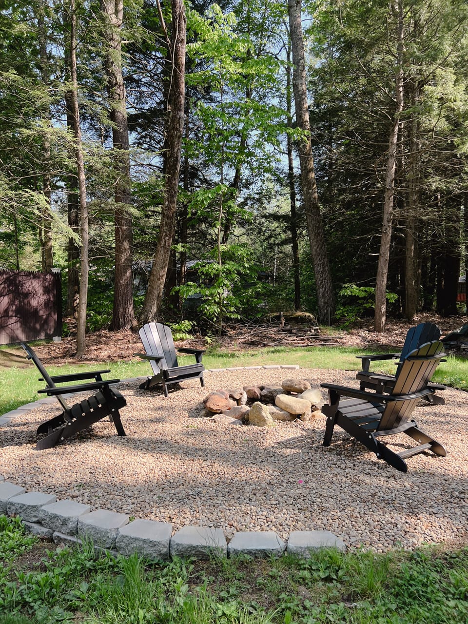 Enjoy our backyard fire pit - the perfect spot for roasting s'mores and hangouts