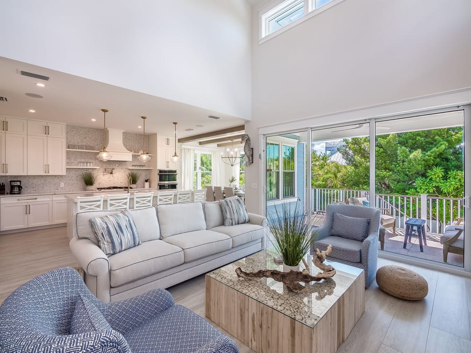 Open living room with doors to patio