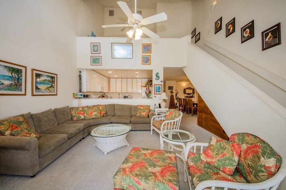 Beautiful living area with high ceiling!
