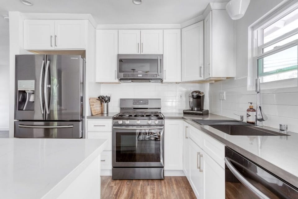 kitchen with black stainless steel appliances 