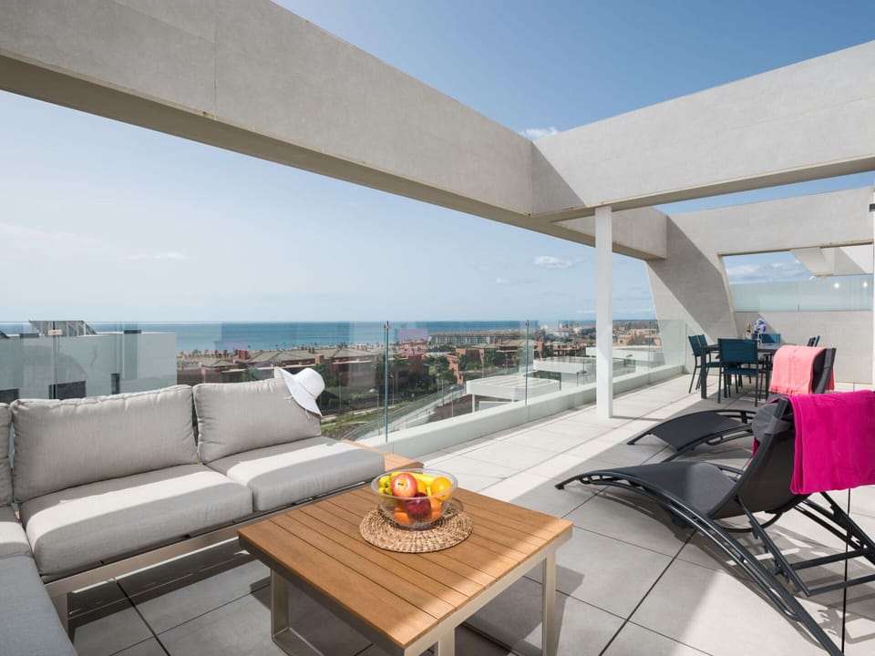 Table, Sky, Furniture, Couch, Shade, Interior Design, Outdoor Furniture, Building, Studio Couch, Chair