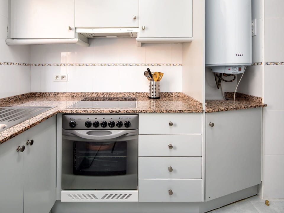 Cabinetry, Countertop, Property, Furniture, White, Building, Kitchen, Kitchen Stove, Product, Kitchen Appliance