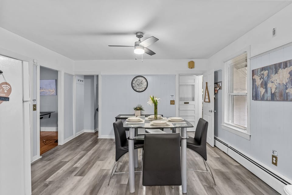 All kitchen basics, fridge, double sink, 2 tables, seating for more than 6 guest