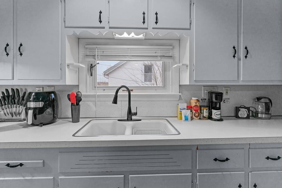 Electric kettle, dish soap, microwave, toaster oven, blender, & full knife set.