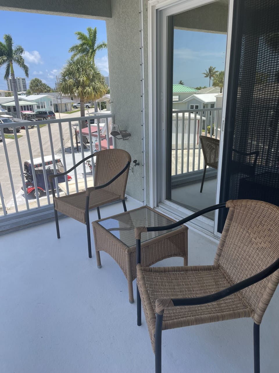 Upstairs balcony off bedroom with king size bed. 