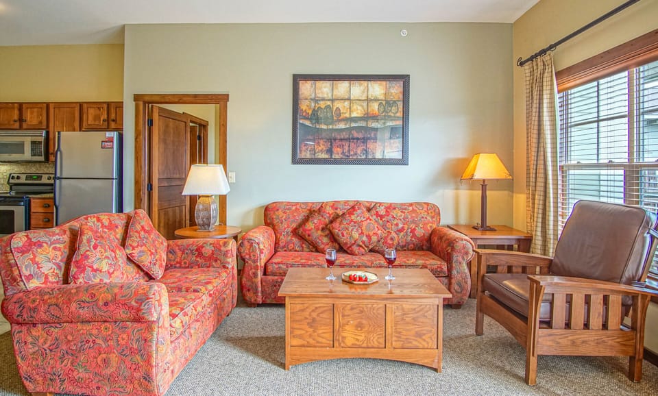 Living room includes a sleeper sofa