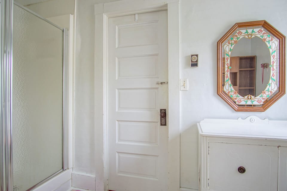 This bathroom has a standing shower only no tub.