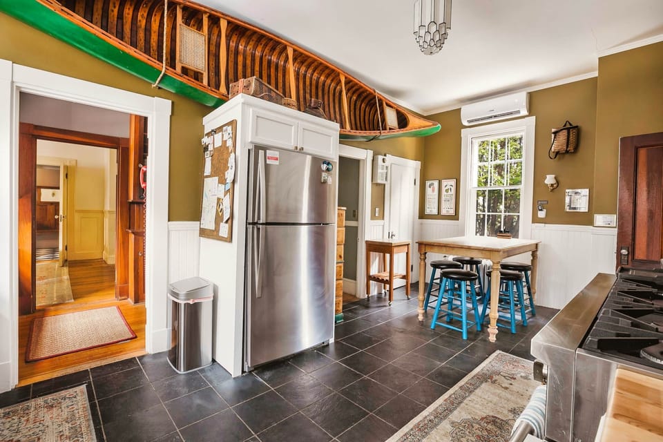 1st Floor - updated & fully stocked main kitchen. 8 burner oven and two fridges