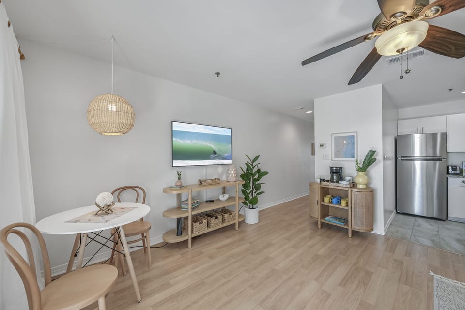 Relax in your bright, modern living space where coastal vibes meet contemporary comfort—complete with full kitchen and stylish furnishings.