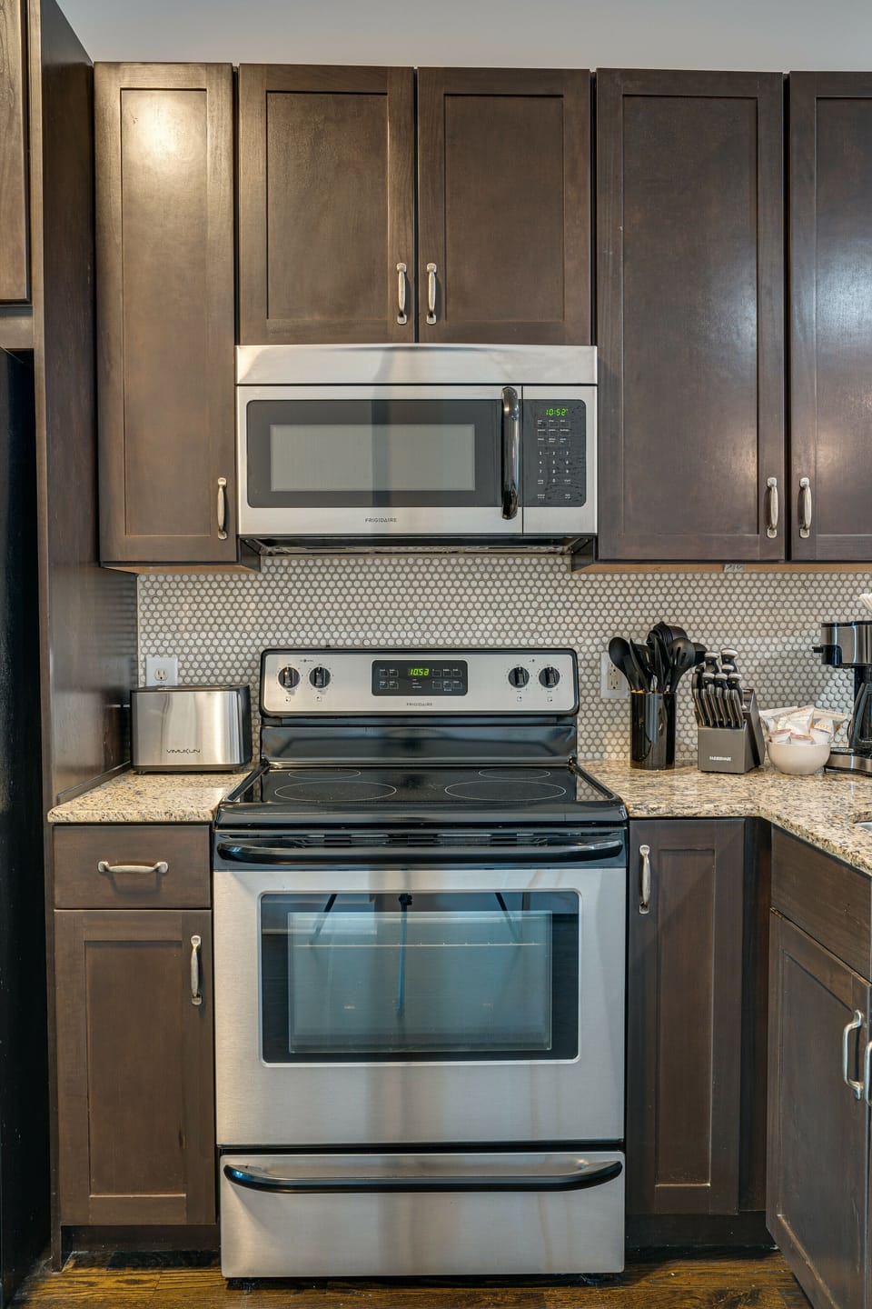 Fully equipped kitchen with stainless steel appliances