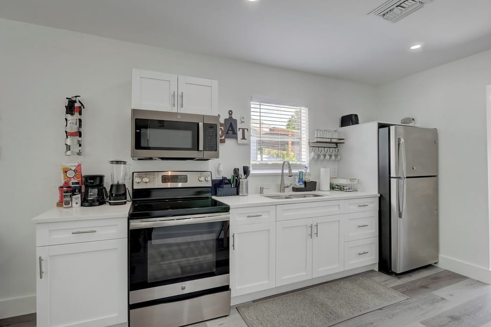 The Kitchen Includes a Blender, Coffee Maker, Microwave and More!