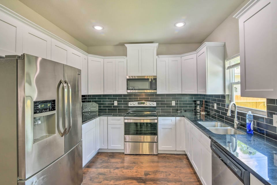 Kitchen | 2nd-Floor Bedrooms/Showers | Free WiFi | Towels & Linens