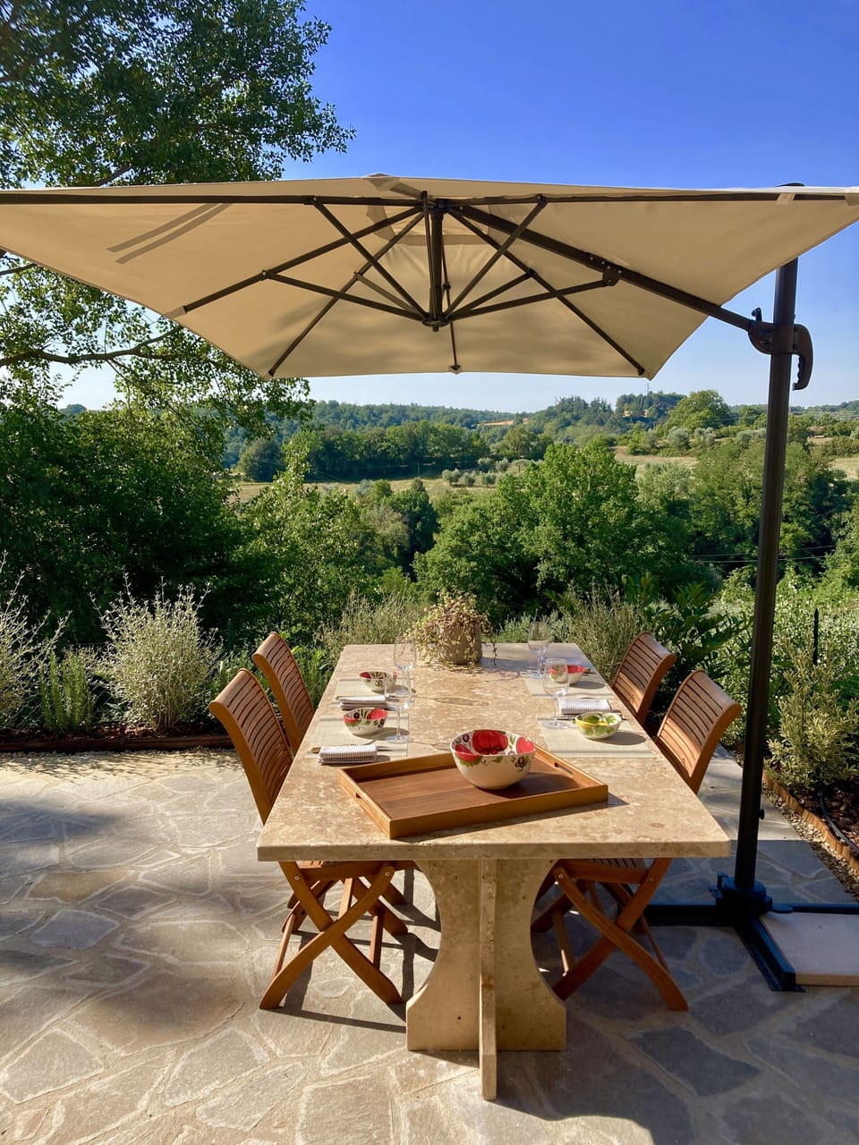 Dine al' fresco on our sumptuous Travertine marble dining table.