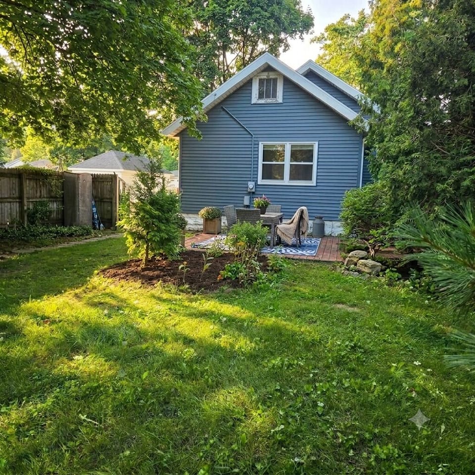 Semi private yard with deck and dining area 