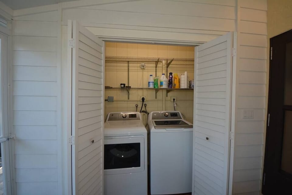 Spacious laundry on the lanai with large-capacity machines 