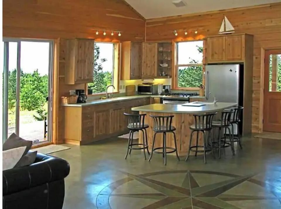 Large, open air kitchen has everything you need to make a great meal