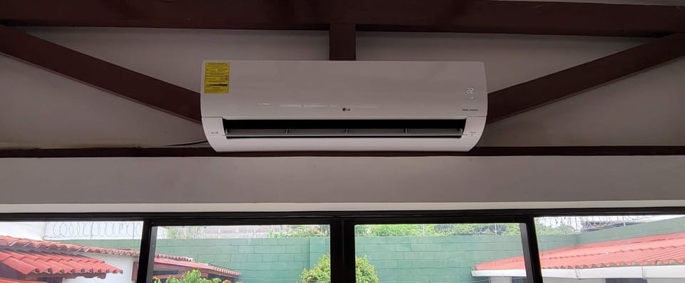 AC in the living room is included from 8AM to 10PM. Temp is set automatically.