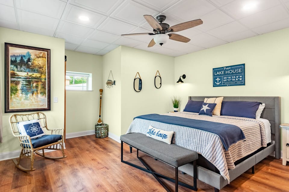 Lower level king bedroom has stunning lake views
