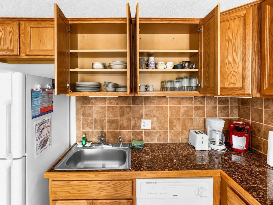 Remodeled kitchen is fully-equipped with pots, pans & utensils.