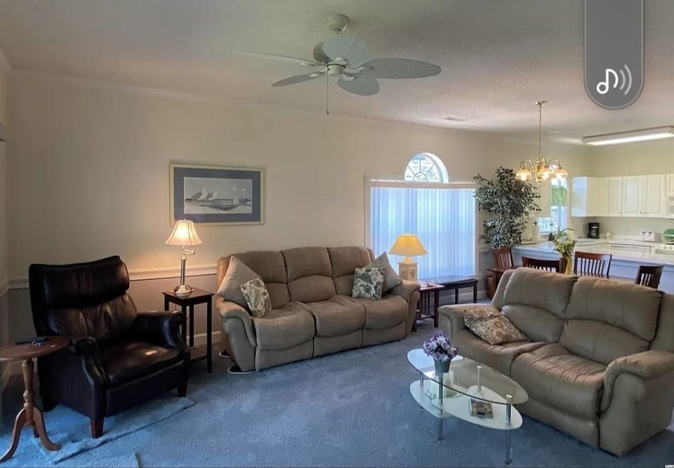 Cozy living room with new reclining furniture for upgraded level of comfort.