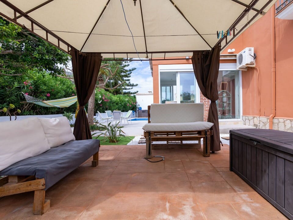 Property, Furniture, Comfort, Building, Shade, Wood, Interior Design, Outdoor Furniture, Architecture, Plant