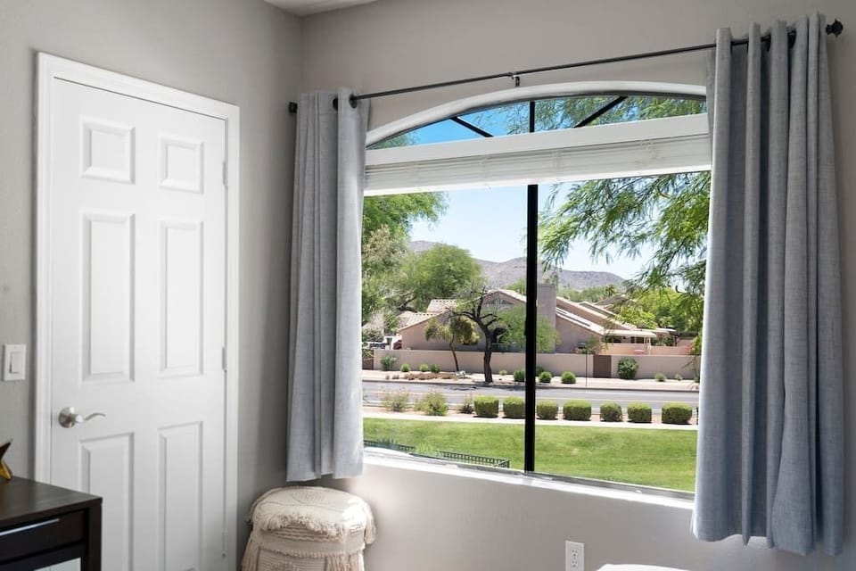 McDowell Mountains visible with tons of natural light. New window treatments installed in September 2025.